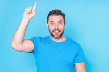 Naklejka premium Man thinking of ideas, eureka idea. Portrait of man has many ideas. Man with index fingers hand gesture man has idea, presenting promo offer. Decision idea process. Good idea.