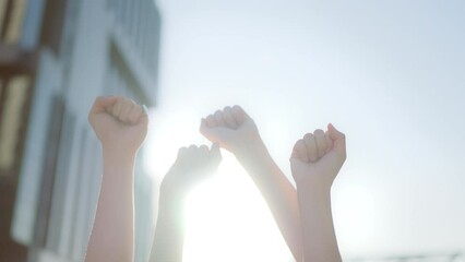 Group of hand fist raised for justice social freedom, teamwork volunteer. Victory as a team, fighting for the success of the organization