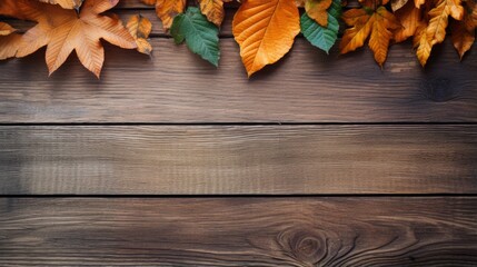 Naklejka na ściany i meble Leaves on a rustic wooden background