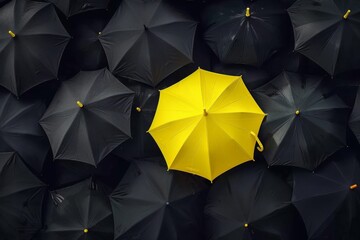 Stand out in a sea of conformity with a bright yellow umbrella that symbolizes your unique leadership and innovative thinking. - obrazy, fototapety, plakaty