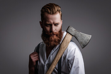 Handsome bearded brutal man. Beard styling. Brutal Caucasian hipster with moustache. Bearded man...