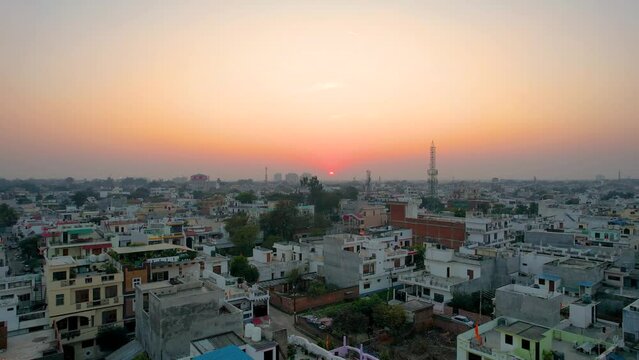 Indian city with houses and population with beautiful sunset