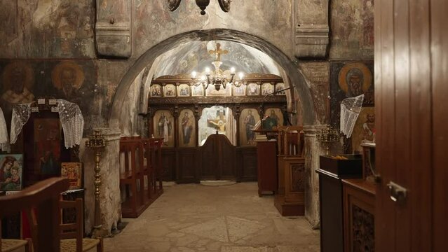 inside of a  Greek church shot ,beautiful ancient chapel with hagiography