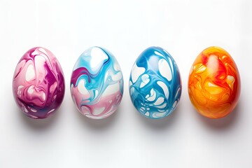 A collection of colorful, marble-patterned easter eggs arranged on a smooth surface against a white background