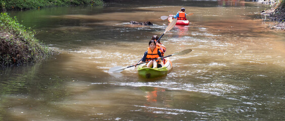 tourists rowing boats to admire nature © Pintira
