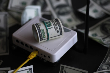 internet router and one hundred dollars. Communication and internet cost concept