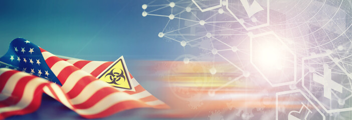 American flag, test tubes and biohazard sign. The concept of American biolabs and research centers.
