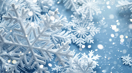 Snow flakes on blue background. Suitable for winter-themed designs