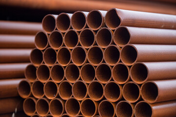 Pile of rusted steel pipes. selective focus