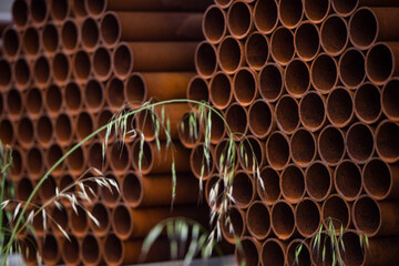 Pile of rusted steel pipes. selective focus
