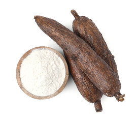 Bowl with cassava flour and roots isolated on white, top view