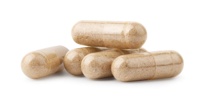 Pile of vitamin capsules isolated on white