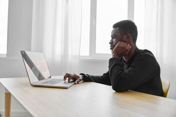 man american african work student office business laptop online internet freelancer
