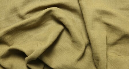 Texture of olive crumpled fabric as background, top view
