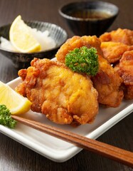 Fototapeta premium Fried Chicken presented in a Tasteful Way - Japanese Karaage Fried Chicken - Battered Chicken Deep Fried