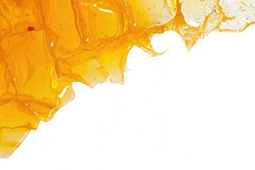 Fototapeta premium close up of a piece of honey in syrup on white background