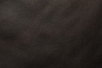 Texture of brown suede fabric as background, top view