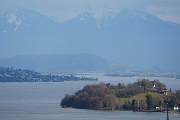 Horgen, hirzel, and halbinsel au with view on zurich see and the horgen church. Landscape...