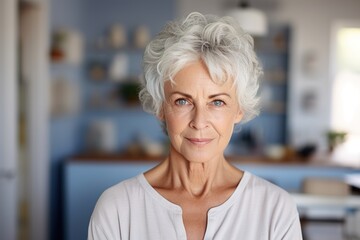 Confident senior woman with curly grey hair and white blouse - 734751058