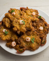 Tortitas de Camarones. Traditional tapa of flour and egg dough with shrimp or prawns, very famous in the Cadiz area in Spain.