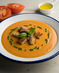 Spanish tomato soup with basil oil.