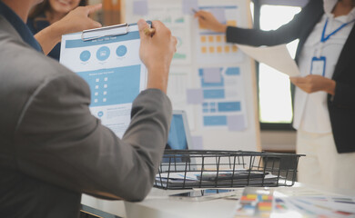 Close up ux developer and ui designer use augmented reality brainstorming about mobile app...