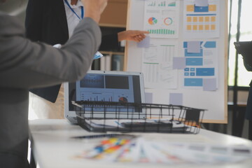 Close up ux developer and ui designer use augmented reality brainstorming about mobile app interface wireframe design on desk at modern office.Creative digital development agency
