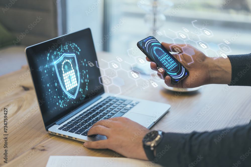 Aufkleber Person using smartphone to control virtual padlock on laptop for secure access. Encryption concept