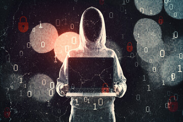 Hacker in hoodie showing laptop while standing on abstract dark hacking background with bokeh circles and binary coding. Malware and phishing, data theft concept.