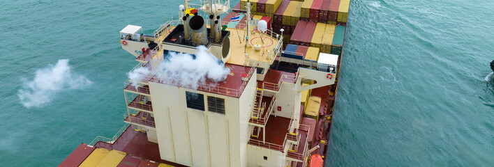 Smoke exhaust gas emissions carbondioxide from cargo lagre ship container ship,Marine diesel engine exhaust gas from combustion, Gas Emission Air Pollution from transportation. green house effect Eco