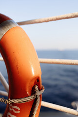 Lifebuoy on a ship overlooking the aegean sea