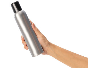 Female hand holding a spray can on white background, Silver perfume spray can or deodorizing spray isoalate on white with clipping path.
