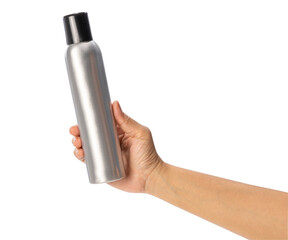 Female hand holding a spray can on white background, Silver perfume spray can or deodorizing spray...