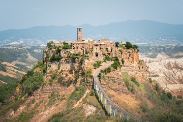 Civita di Bagnoregio - ancient italian town on a rock.  - obrazy, fototapety, plakaty