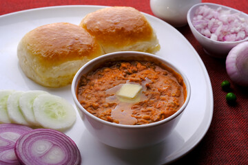 Pav bhaji is a fast food dish from India consisting of a thick vegetable curry served with bread.
