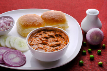 Pav bhaji is a fast food dish from India consisting of a thick vegetable curry served with bread.