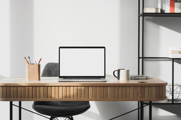 Mockup, laptop computer with empty blank screen over modern office. Home office, workplace, working or studying from home, distance learning, business concept