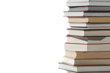 Stack of many different books isolated on white