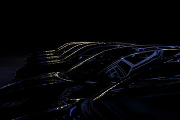 Black sedan luxury cars standing in a row. Fleet of generic modern cars. Transportation. Luxury car...