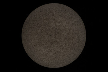 stone ball isolated on black background. big rounded granite rocks are isolated on dark backdrop....