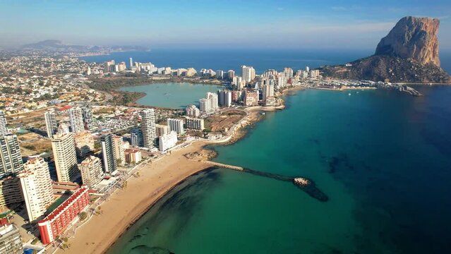 Costa Blanca, Spain. Scenic Calpe city of Aerial drone panoramic high angle view, coastal cityscape panorama
