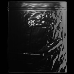 Plastic Bag Wrap PNG Texture : Wrinkled black plastic bag texture on a black background, ideal for creative and decorative design purposes.