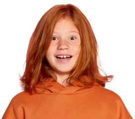 Emotional redhead little girl, child with freckled face smiling with excitement isolated over...