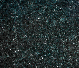 Dark blue stone texture. Blue marble background. Top view. Copy space.