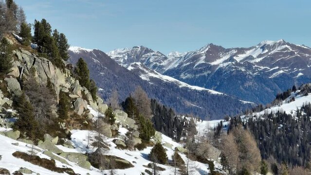 Aerial drone Winter dolomites in Italy. Winter in Madonna di Campiglio village and a ski resort in Italy. Madonna di Madonna di Campiglio and ursus snowpark in Val Rendena dolomites trentino Italy. 