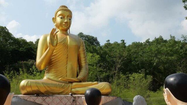 Buddha statue giving blessings in Wat Chak Yai Chanthaburi Thailand