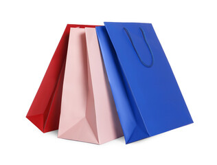 Colorful paper shopping bags isolated on white