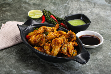 Vietnamese cuisine - fried frog with vegetables
