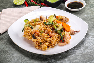 Asian cuisine - Fried noodles with seafood