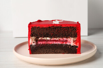 Cut bento cake on white table, closeup